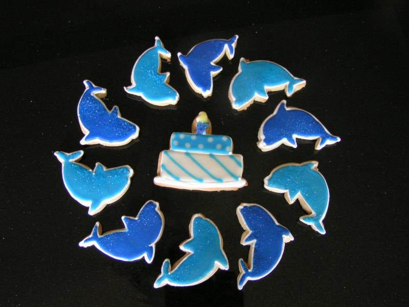 Dolphins and cake